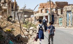  Two students walking to their school in Taiz, Yemen